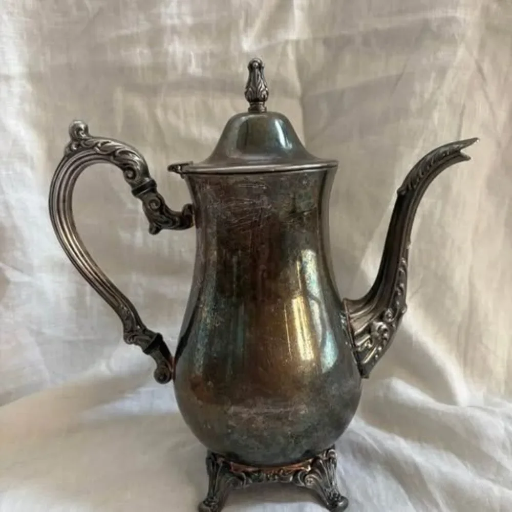 Unbranded ornate silver